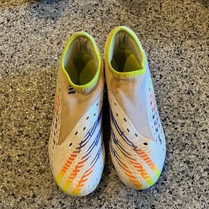 adidas Kids White and Neon Slip-On soccer cleats. -Predators